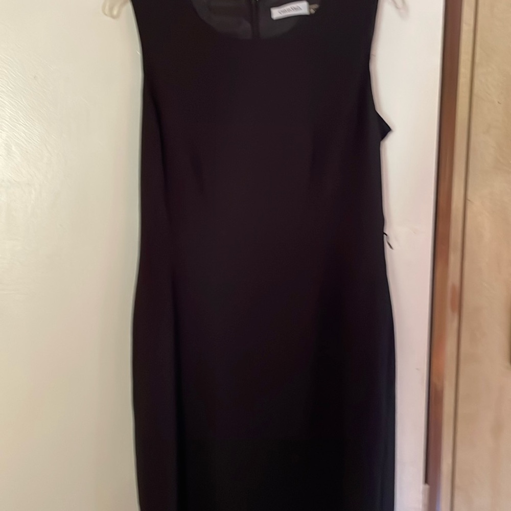 Ladies size 10 black sleeveless dress zip back has split tail lined super nice
